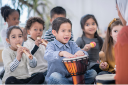 Students playing instruments in class